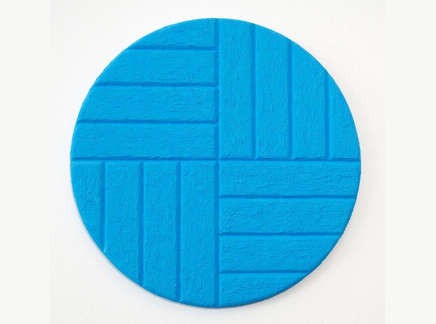 On an oval canvas is light blue color with horizontal and vertical stripes.